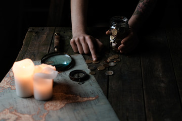 person counting te money saved for the next travel destination