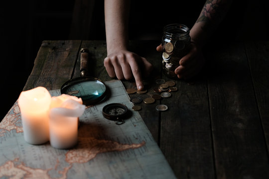 person counting te money saved for the next travel destination