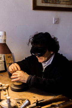 Man making handmade rubber stamp