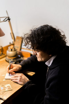 Man making handmade rubber stamp