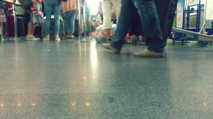 Defocusing. Busy Airport Terminal. Traveler at airport 
