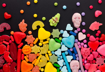 Assortment of candy ordered in rainbow colors