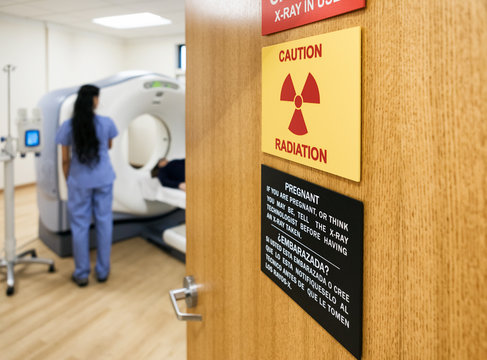 Clinic: Warning Signs On Door Outside Of CT Scan