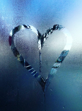 Heart drawn on a wet window