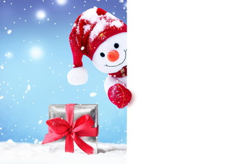 Cute funny snowman holding white page, greeting Christmas card.