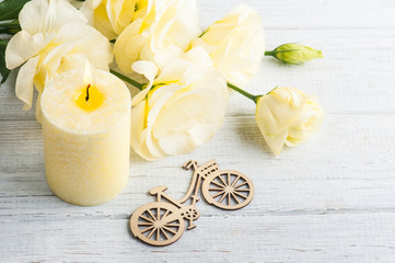 Wooden bike with yellow lisianthus
