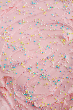 pink frosting with sprinkles