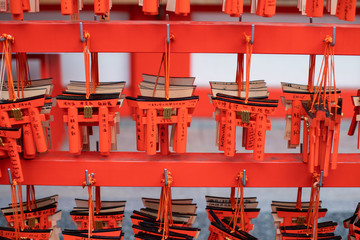 Fushimi Inari Shrine taisha ema wooden tablets in shape of torii gates. Fushimi Inari Shrine is an important Shinto shrine and famous sight in southern Kyoto