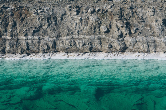 Calcium chloride mine tailings and canal in desert