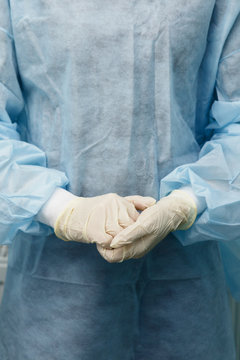 Midsection of doctor in scrubs