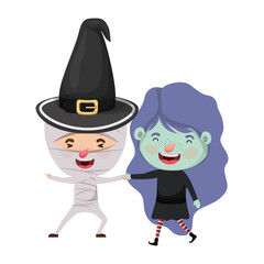 cute little kids with witch and mummy costume