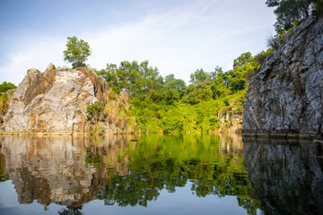 Lake and roks in Danzhou Stone Flower Caves, Geopark next to Haikou, Hainan, China