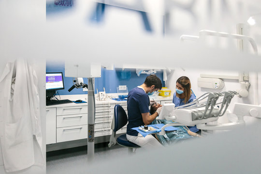 Dentists working on patient