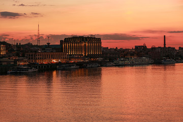 KYIV, UKRAINE - JUNE 03, 2019: Beautiful view of embankment and Dnipro river at sunset