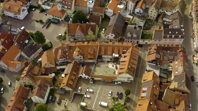 Aerial view of the city Endingen am Kaiserstuhl in germany on a sunny day in summer.Pan to the right above the church.