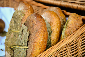 Fresh bread on table close-up.  The healthy eating and traditional bakery concept. Rustic style