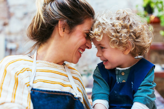 A loving moment between mother and kid.