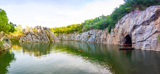 Lake and roks in Danzhou Stone Flower Caves, Geopark next to Haikou, Hainan, China