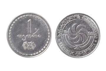 Bouth sides of the Georgian coin 1 tetri on a white background