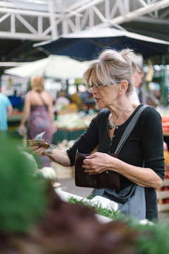 Woman shopping on a green market