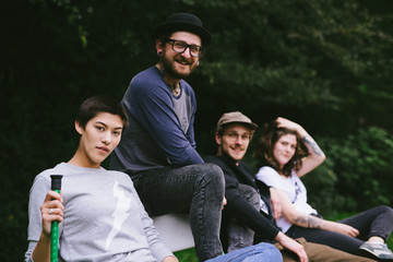 Group of friends playing miniature golf