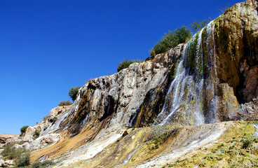 Band-e Amir lakes near Bamyan (Bamiyan) in Central Afghanistan. The lakes at Band e Amir national park are formed by travertine dams. Detail of a travertine wall from below at Band e Amir, Afghanistan
