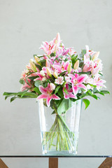 Pink lily flowers bouquet background