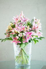 Pink lily flowers bouquet background