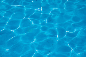 blue water of a swimming pool. Summer time image