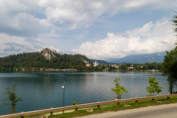 Fototapeta premium View of Bled Lake with Ducks and small church on the Island. Slovenia, Bled Lake