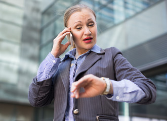 Portrait of busy female rushing to important meeting
