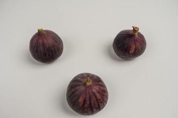 Ripe and beautiful figs on a white background. also in the context