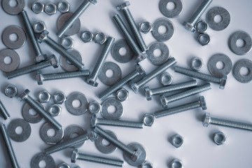 Nuts and screws on a white background