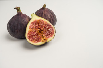 Ripe and beautiful figs on a white background. also in the context