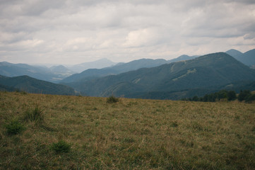 Fototapeta na wymiar Hiking in the Low Tatra mountains in Slovakia, almost alone on the ridgeway, only majestic mountains