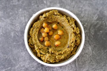 Eggplant hummus with olive oil. Healthy organic food. Top view. 