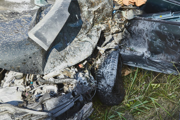Car accident on a road frontal collision with a heavy truck