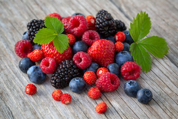 Ripe berries on a wooden board