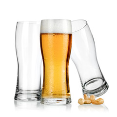 Glass of beer with two empty glasses