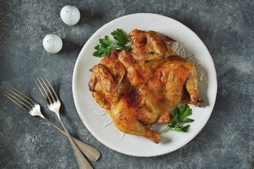 Spatchcocked barbecue chicken with spices and garlic