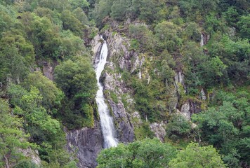 High Waterfall on a Mountain Range