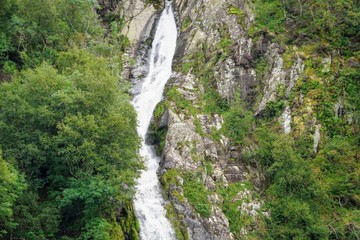 High Waterfall on a Mountain Range