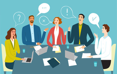 People in suits at the table with laptops and papers talking about important issues.