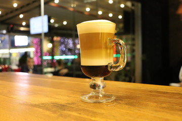glass of beer on wooden table