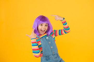 Change color. Fantasy hair trend. Kid girl with bright vibrant hairstyle. Artificial wig concept. Pigment dye hair. Growing freedom for self expression. Coloring childs hair great way upgrade costume