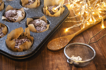 Fototapeta premium Baking tin with a tasty chocolate muffins