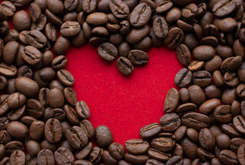 Creative concept photo of heart made of coffee on isolated background