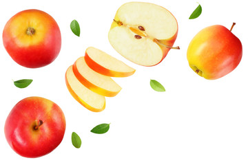 red apples with slices and green leaves isolated on a white background. top view