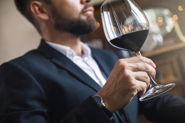 Man with a glass of red wine