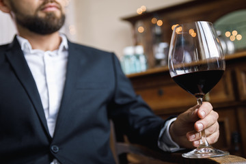 Man with a glass of red wine